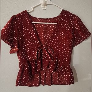 Burgundy polka dot tie front ruffle edge shrug.  Size S